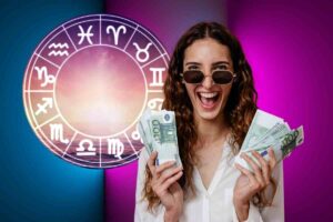 Donna con soldi e segni zodiacali