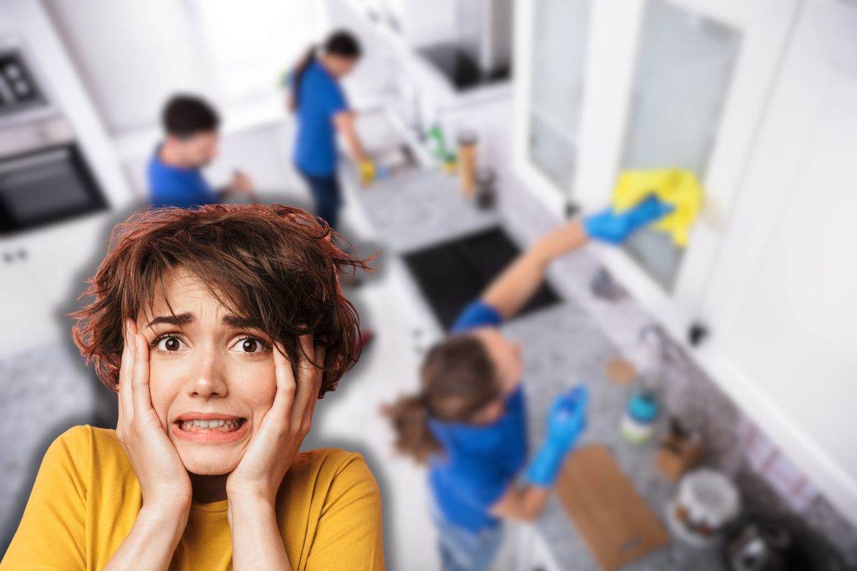 persone che puliscono cucina e donna spaventata